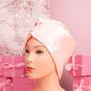 Bonnet/serviette en satin